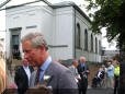  Prince Charles moves along the crowd